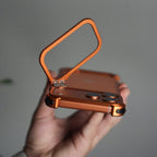 iPhone 17 Pro max 9-Shaped Frameless Metal Bumper Case with Hidden Lens Stand | Shockproof Aviation-Grade Alloy Frame